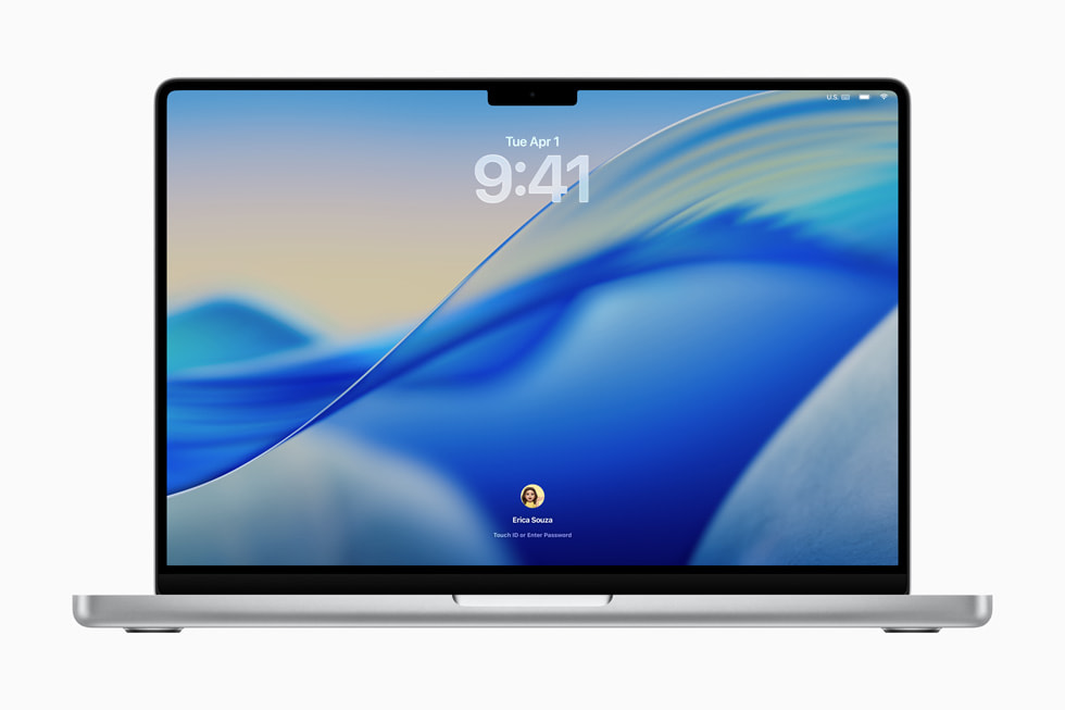 MacBook Pro affichant l’écran de verrouillage officiel de macOS Tahoe 26.