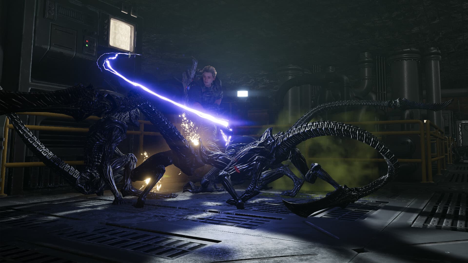 Capture officielle d’Aliens: Fireteam Elite 2 montrant un Marine combattre plusieurs xénomorphes.
