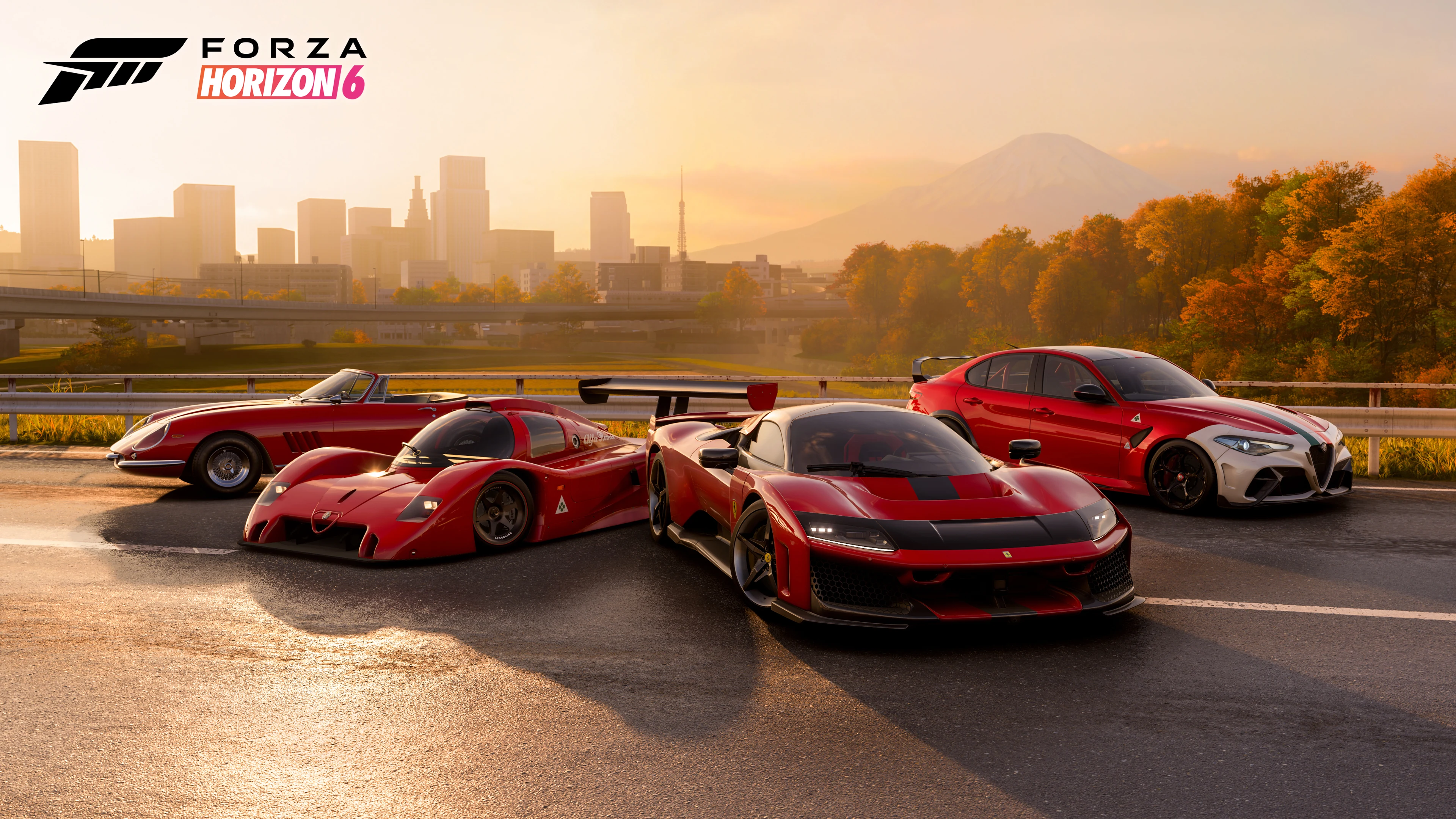 Capture officielle de Forza Horizon 6 réunissant les quatre voitures du pack Italian Passion devant Tokyo et le mont Fuji.