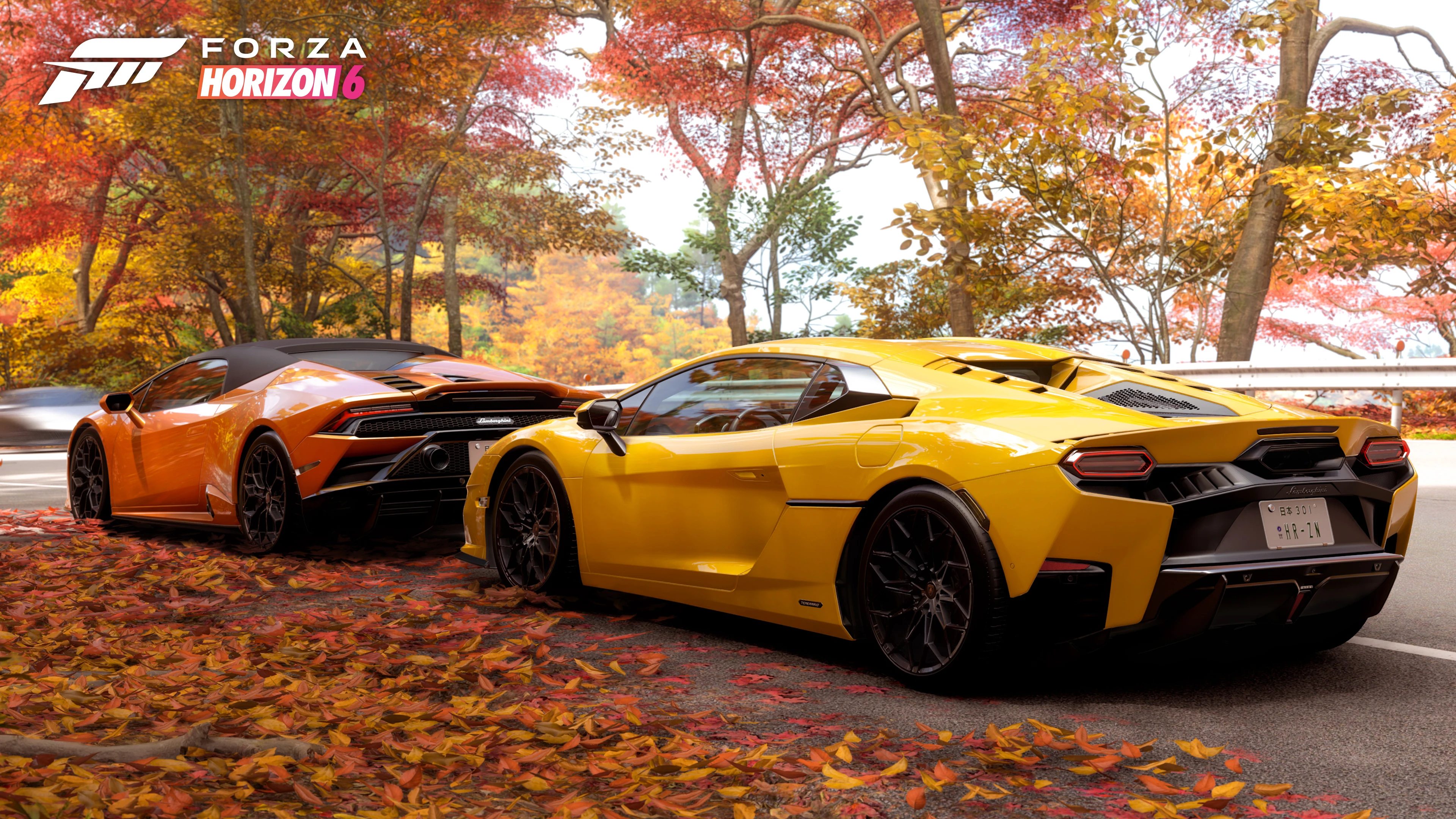 Capture officielle de Forza Horizon 6 montrant deux Lamborghini dans un paysage d’automne japonais.