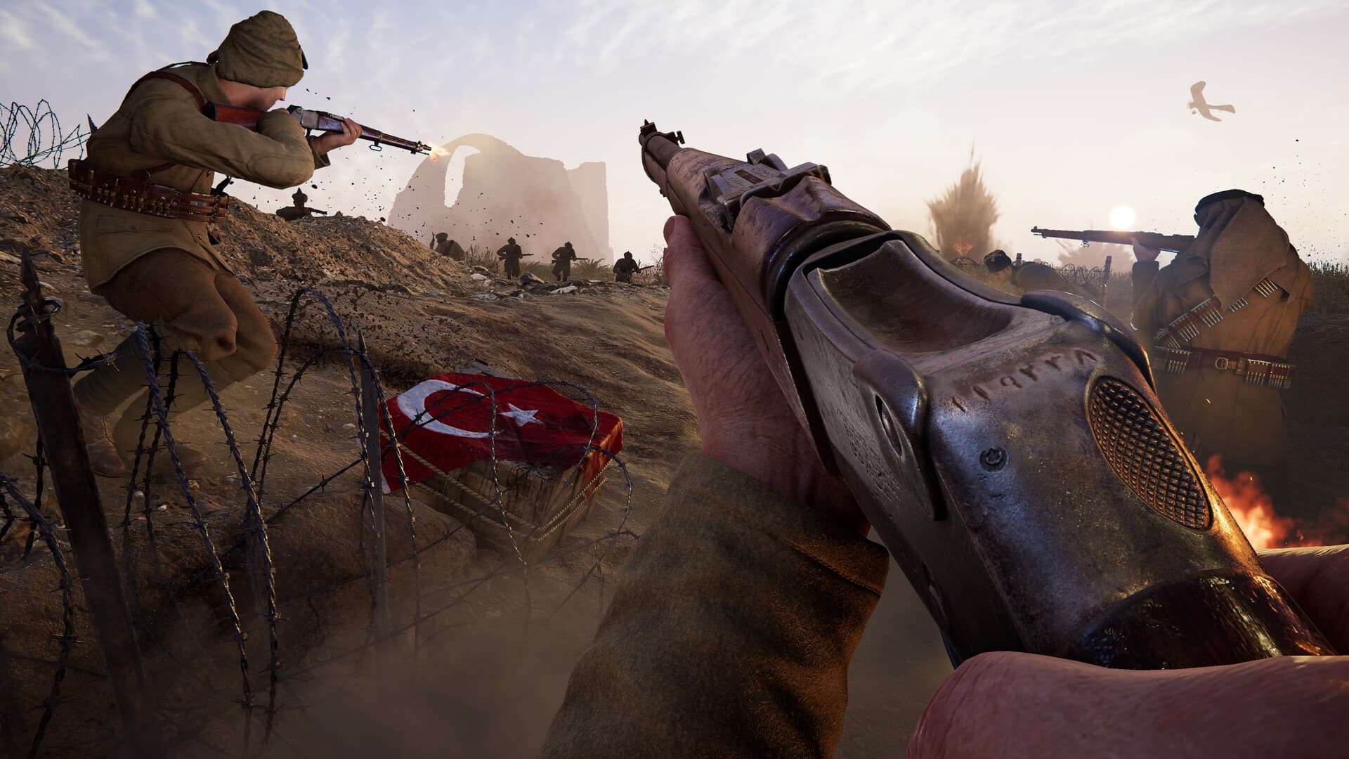 Capture officielle de Gallipoli montrant une escouade ottomane progressant derrière des barbelés.