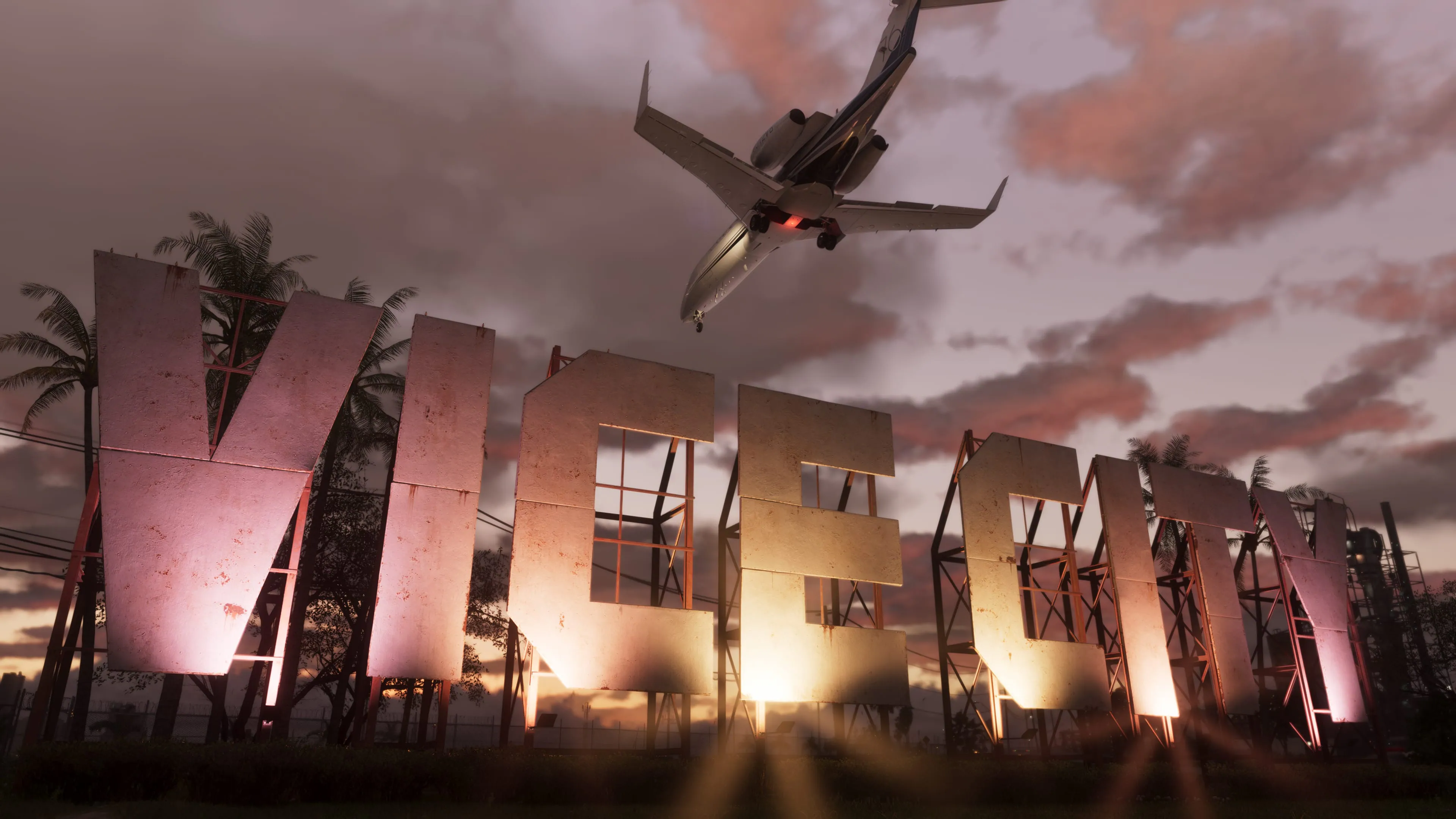Vue officielle de Vice City dans Grand Theft Auto VI, avec des immeubles et des palmiers au coucher du soleil.