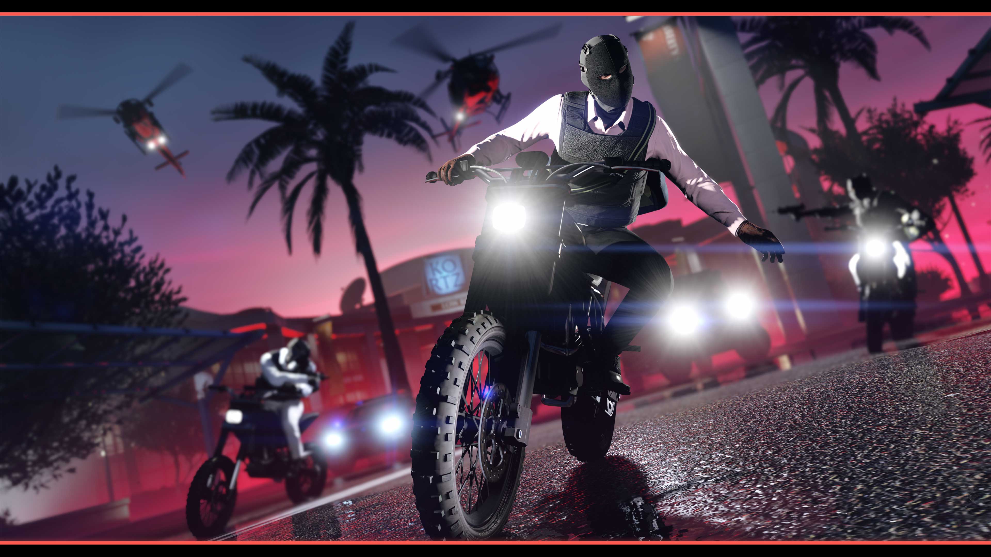 Capture officielle de GTA Online montrant des braqueurs à moto devant le Kortz Center de nuit.