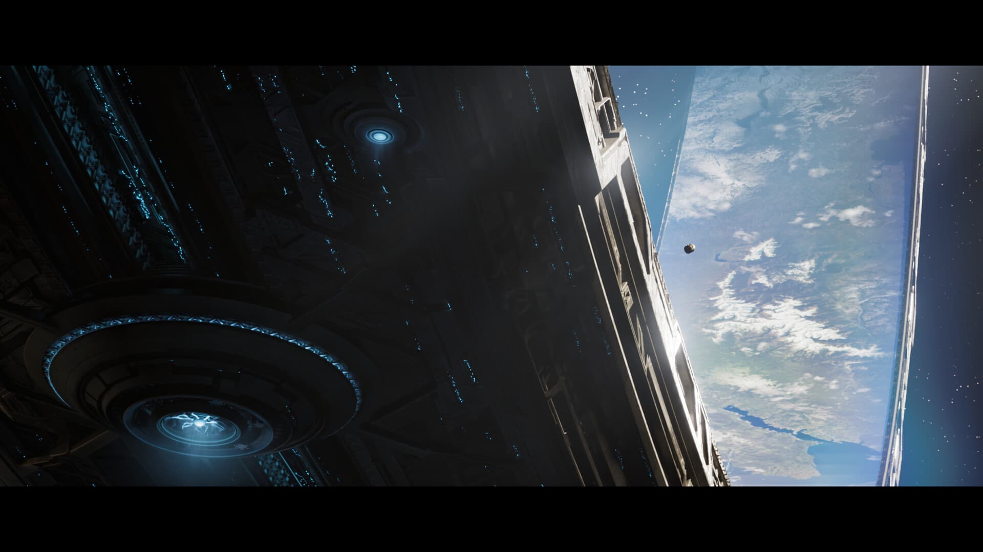 Plan officiel d’une cinématique de Halo: Campaign Evolved montrant l’anneau depuis une structure forerunner.