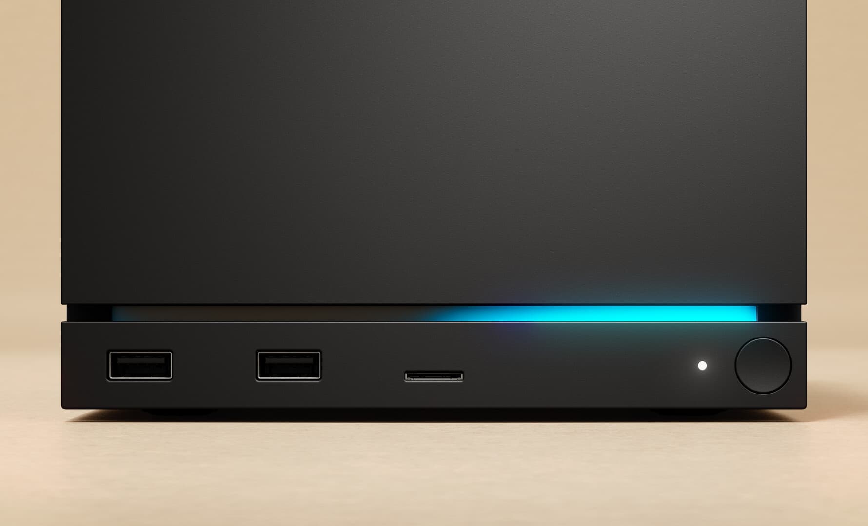 Gros plan officiel sur la barre lumineuse cyan et le bouton de la Steam Machine.