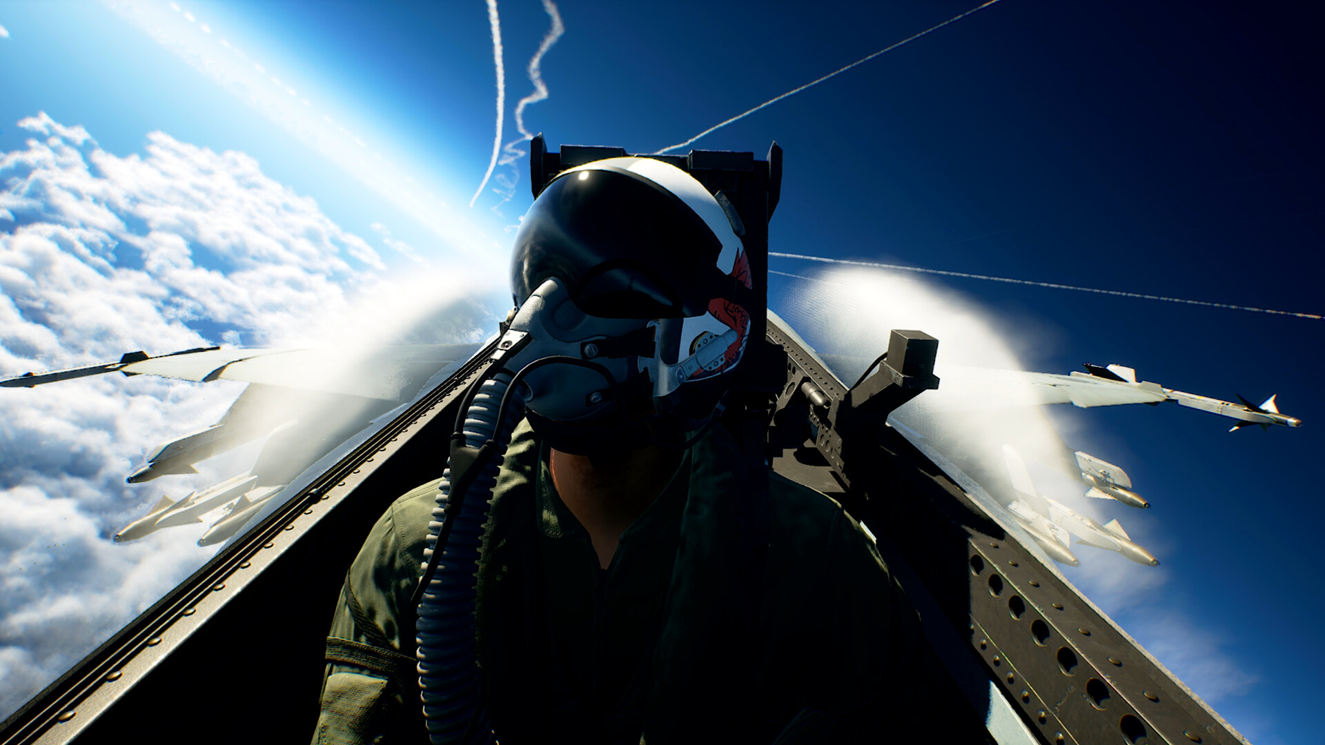 Un pilote est visible dans son cockpit au-dessus d’une mer de nuages.