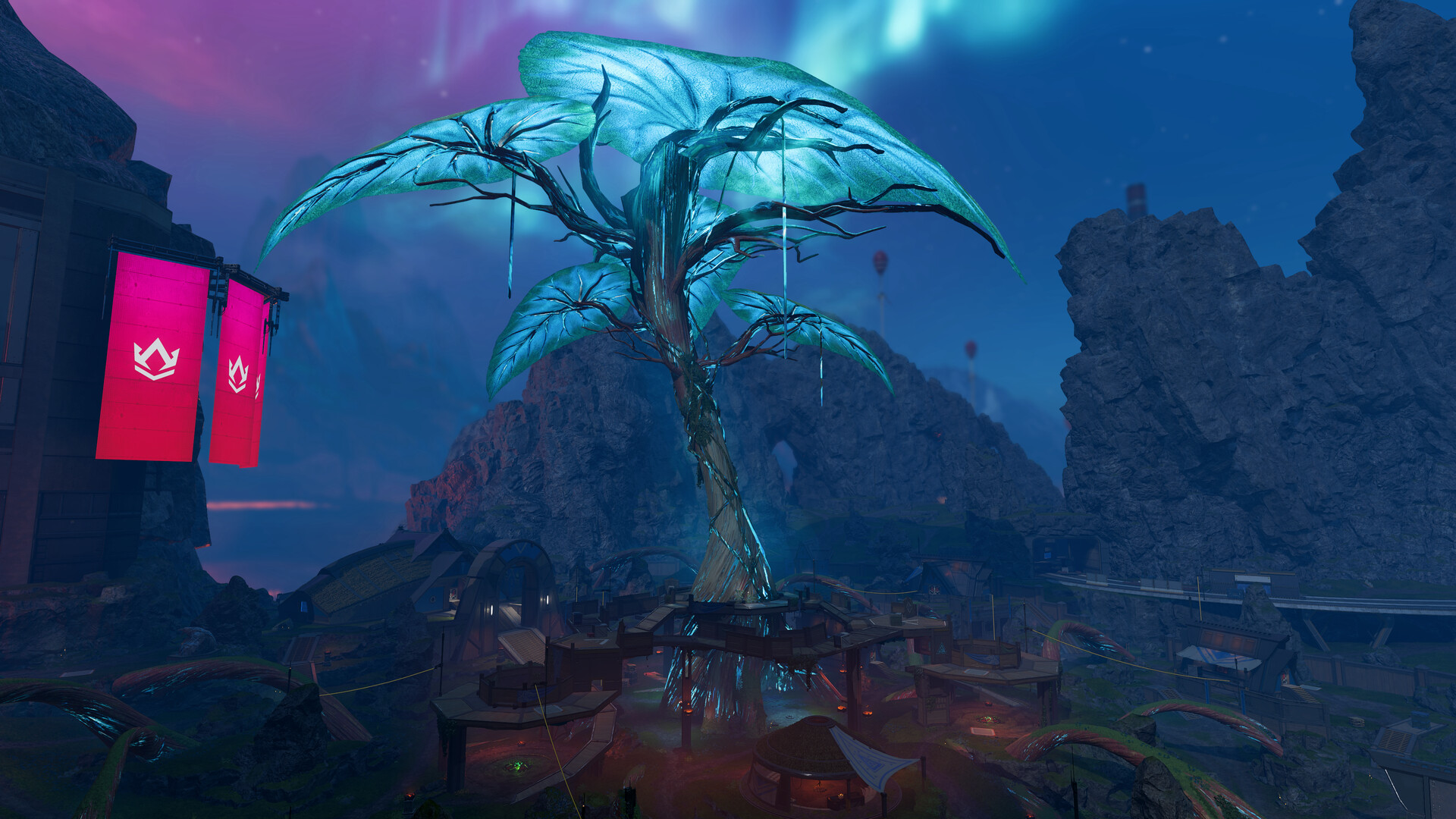 Un arbre lumineux domine les constructions d’une zone de combat.
