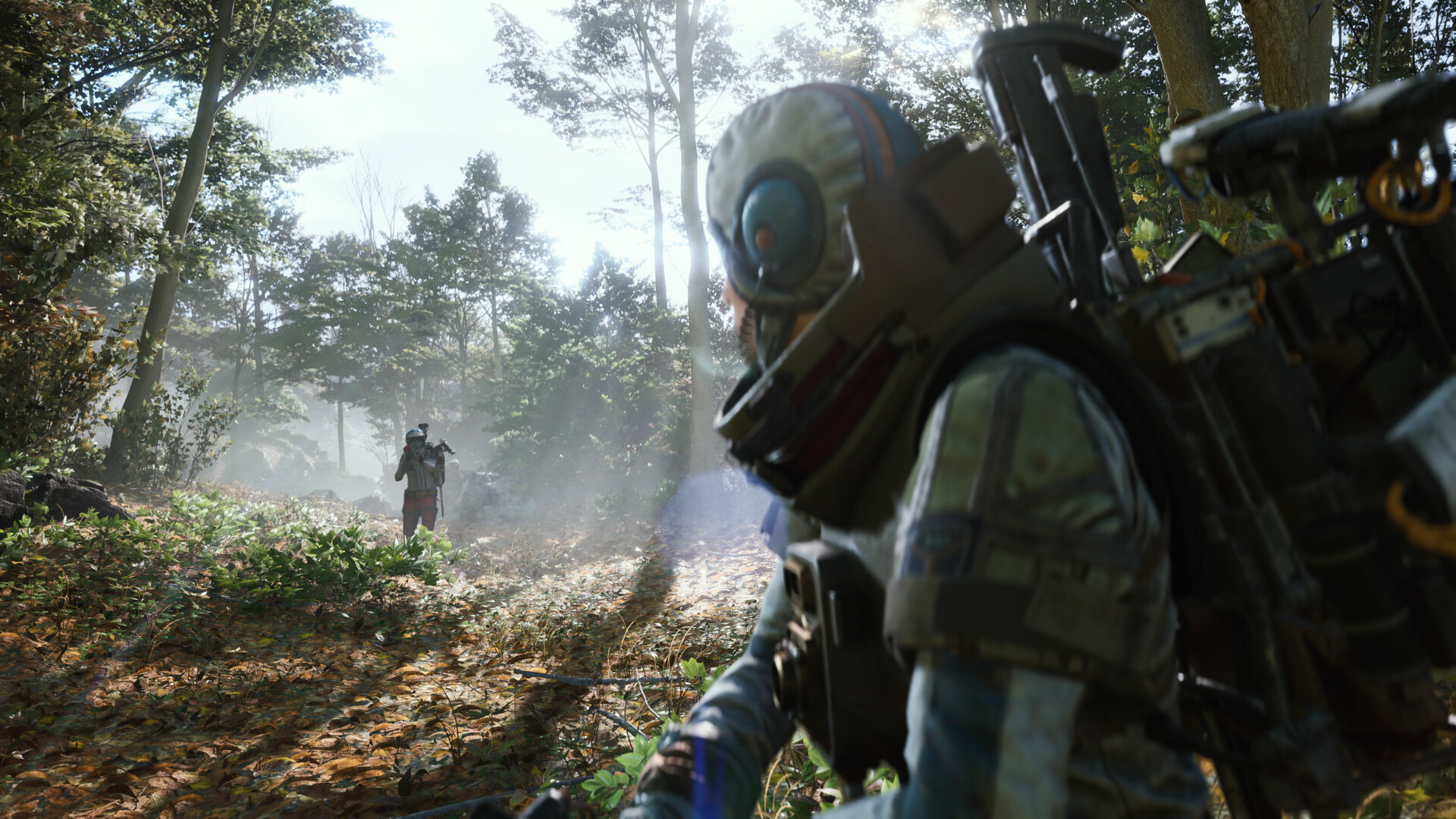 Des Raiders traversent une forêt avec leur équipement de récupération.
