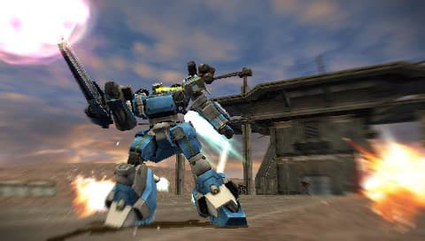 Un Armored Core se tient près d’une installation industrielle.