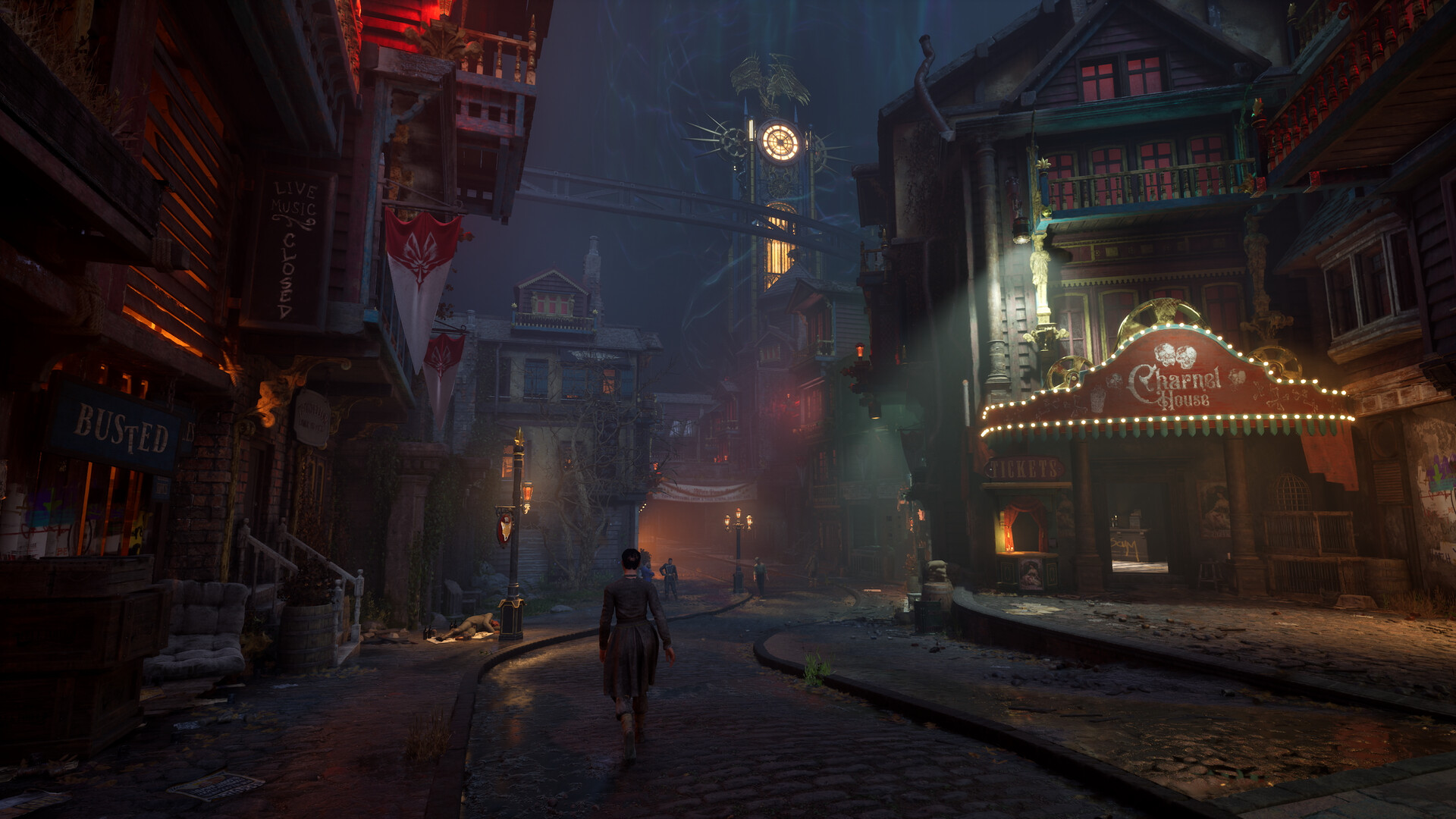 Une rue victorienne est éclairée de lumières colorées.