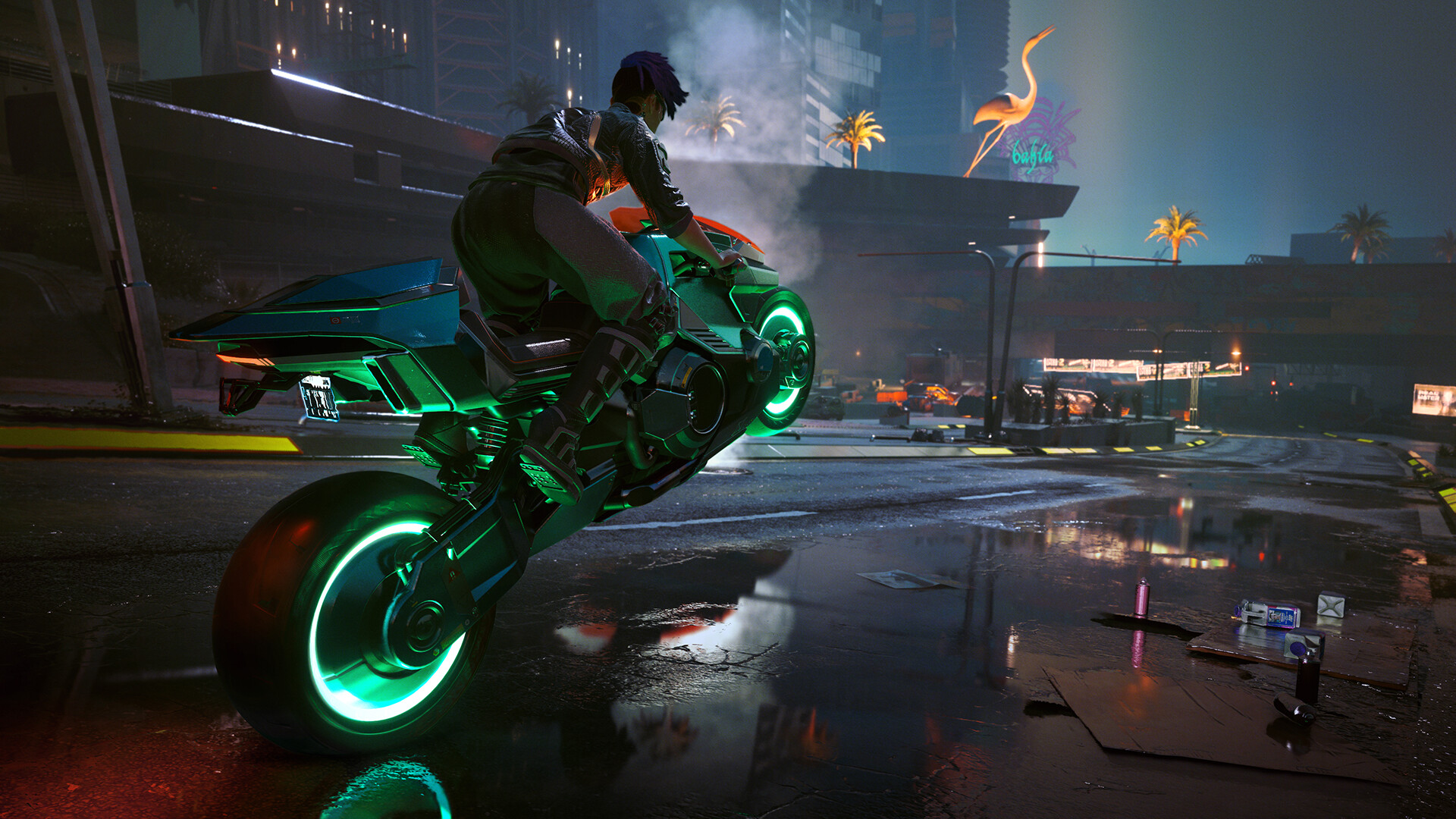 Un motard effectue un saut de nuit.
