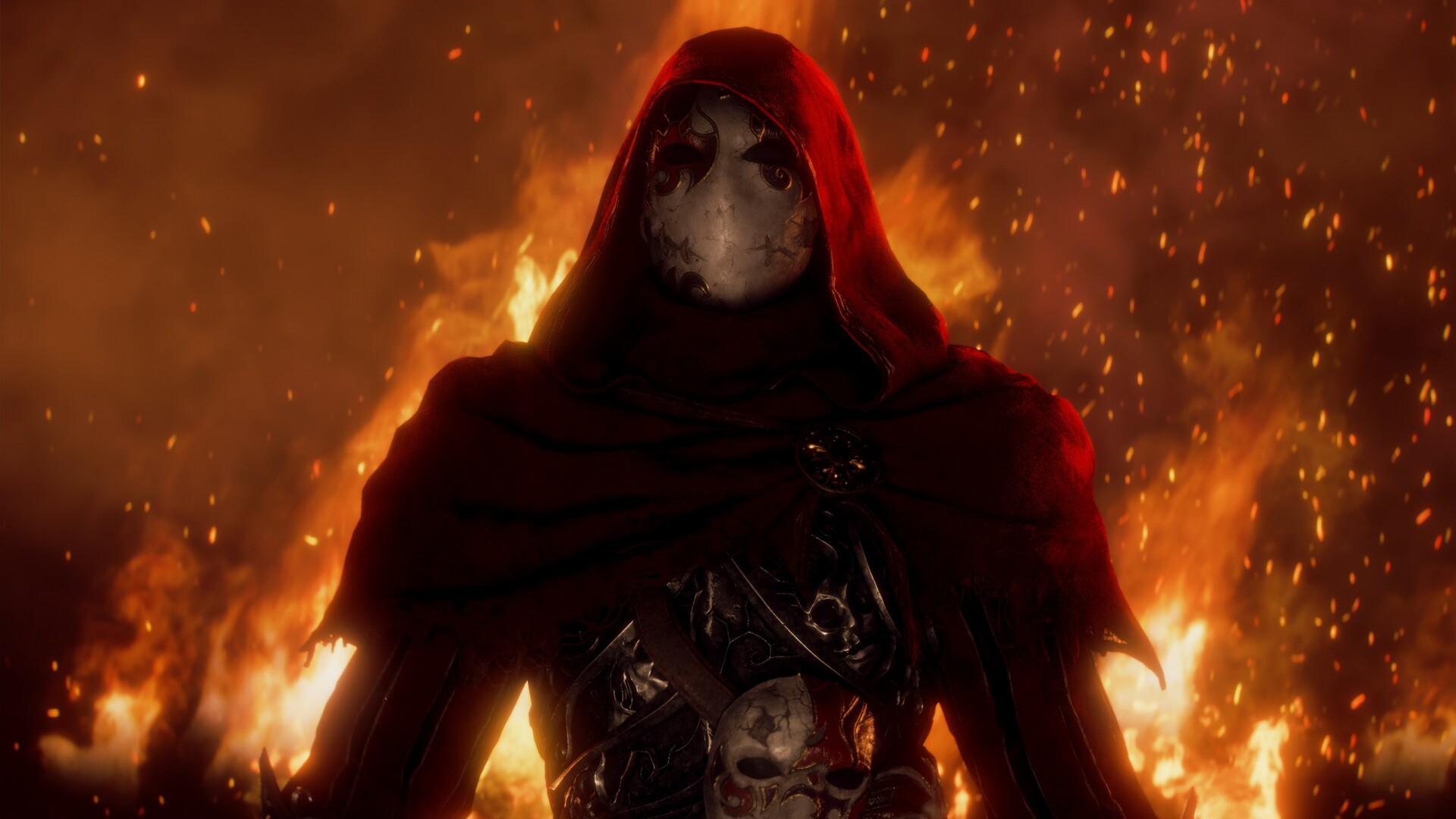 Une silhouette encapuchonnée se tient devant des flammes.