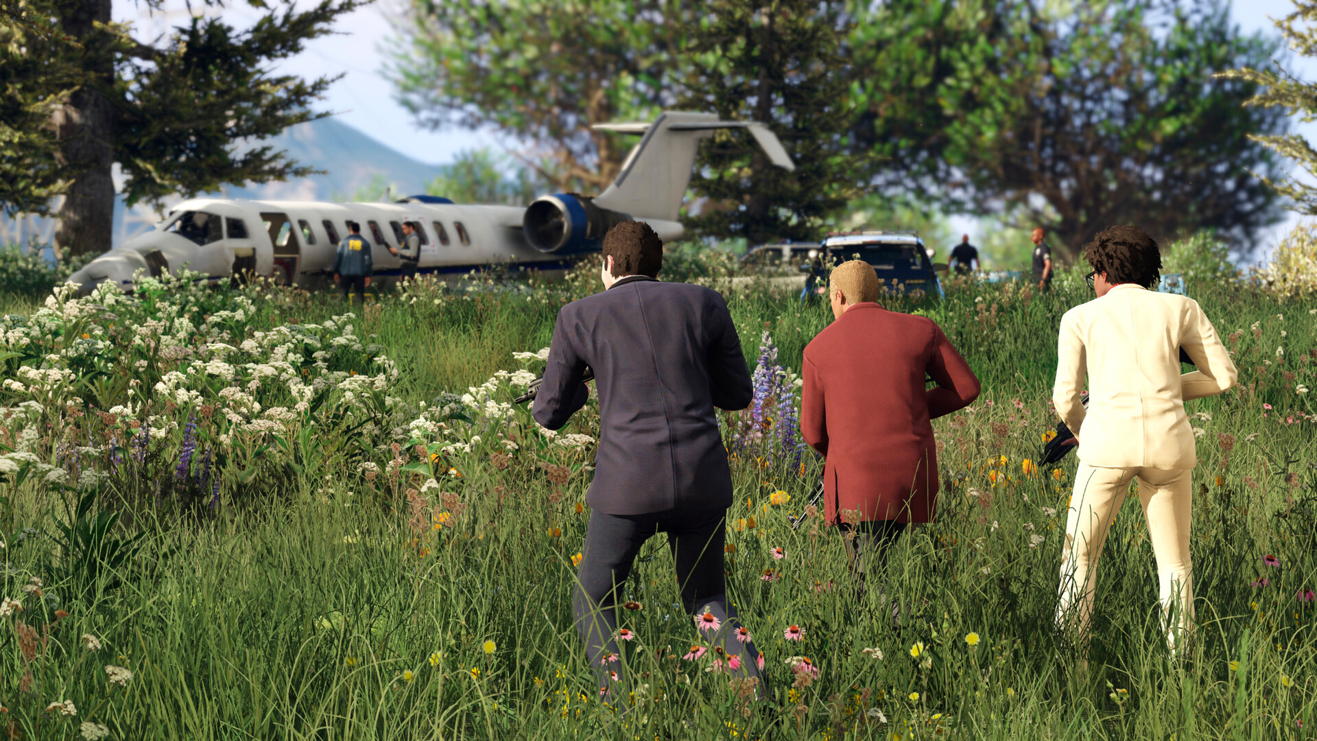 Trois protagonistes devant une épave d’avion — Grand Theft Auto V Enhanced, visuel officiel