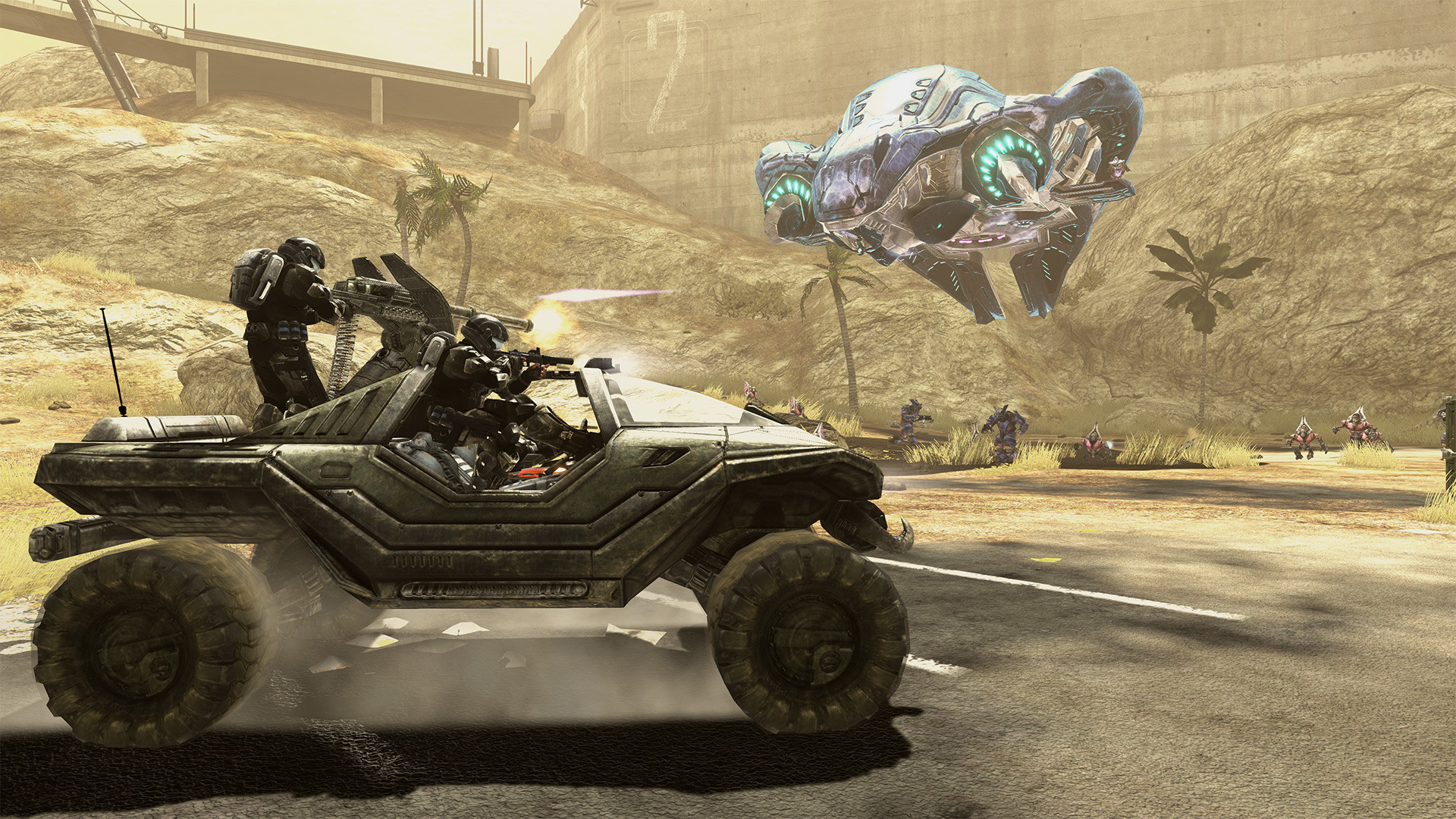 Halo 3: ODST dans MCC : un Warthog et son tireur affrontent un aéronef au-dessus d’une route.