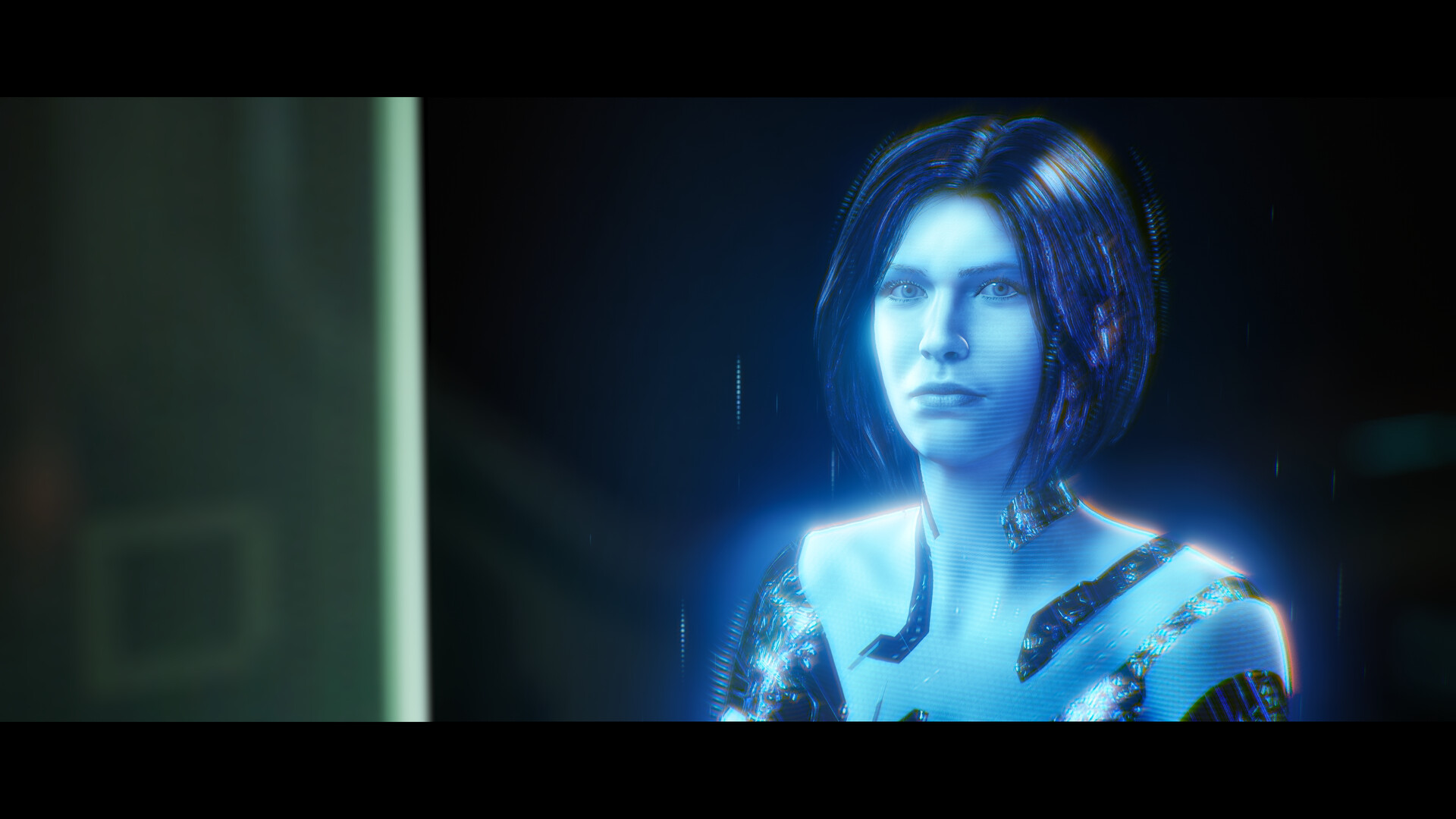 Une figure holographique bleue apparaît dans un intérieur.