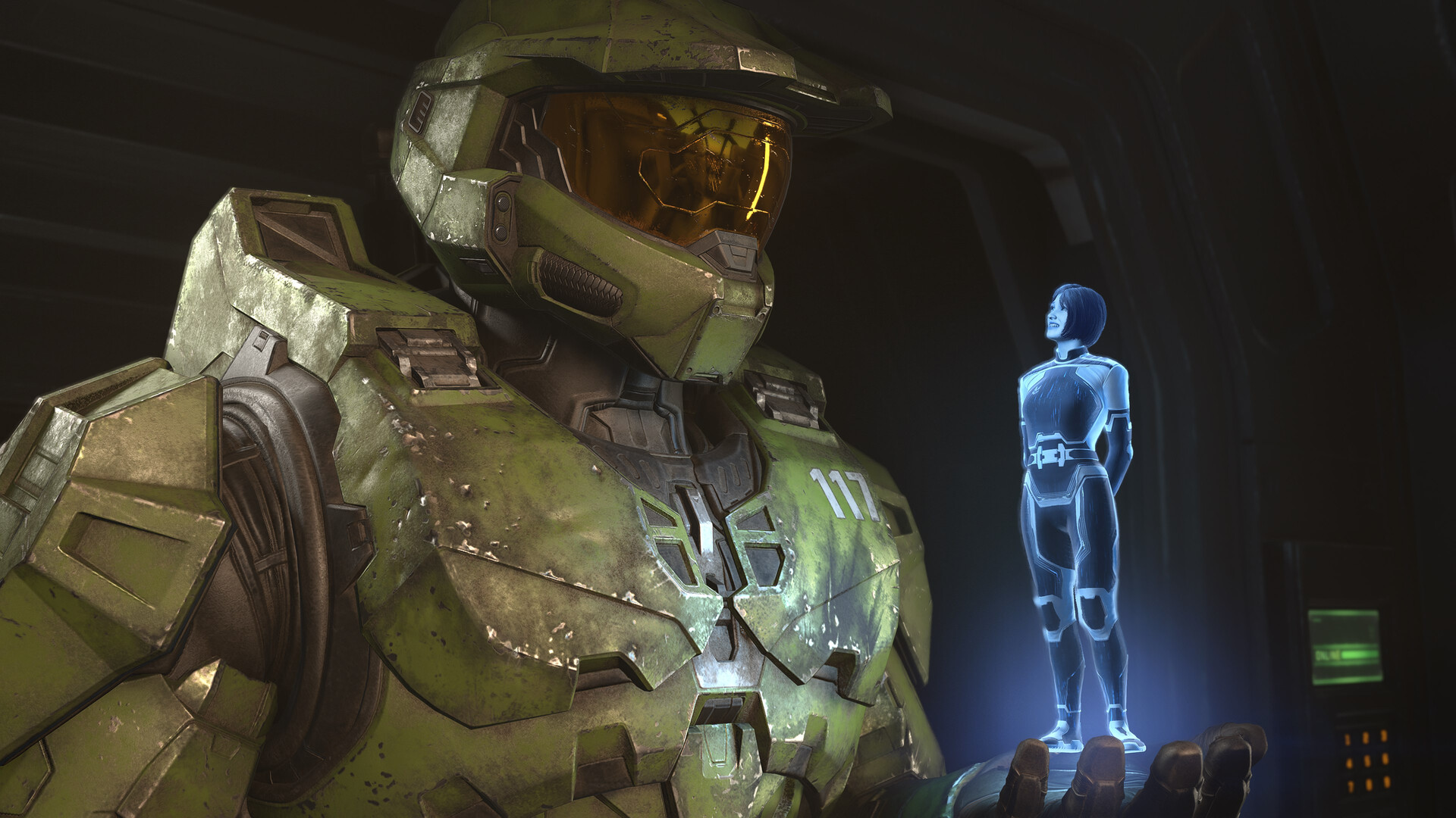 Cinématique de Halo Infinite : le Major regarde l’hologramme bleu de l’Arme dans sa main.