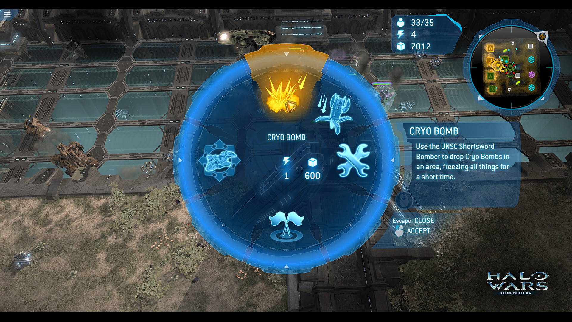Capture de Definitive Edition : menu radial du pouvoir Cryo Bomb au-dessus d’une base.