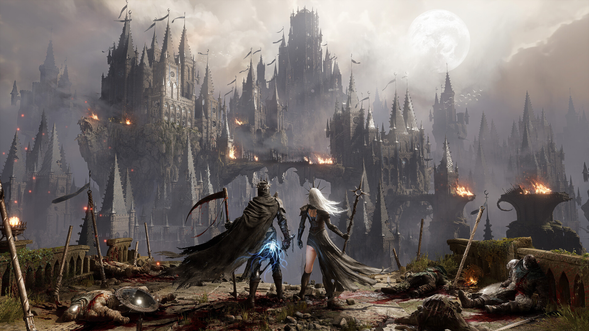 Des aventuriers observent une forteresse aux nombreuses tours.