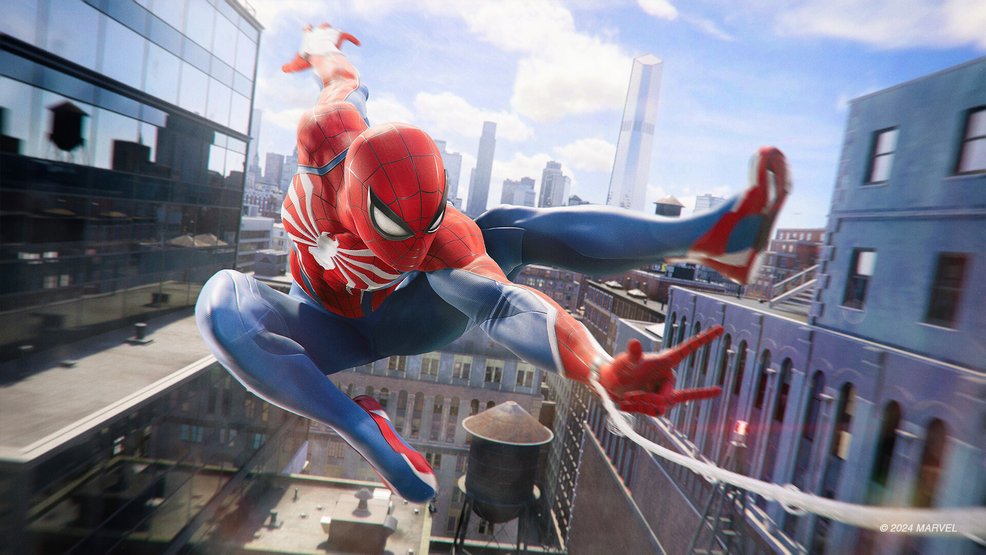 Spider-Man bondit au-dessus d’un toit en ville.