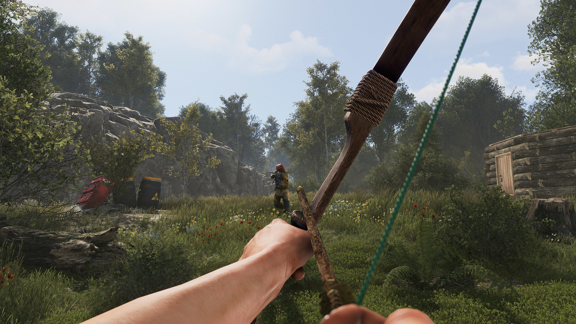 Un joueur bande son arc dans une forêt.