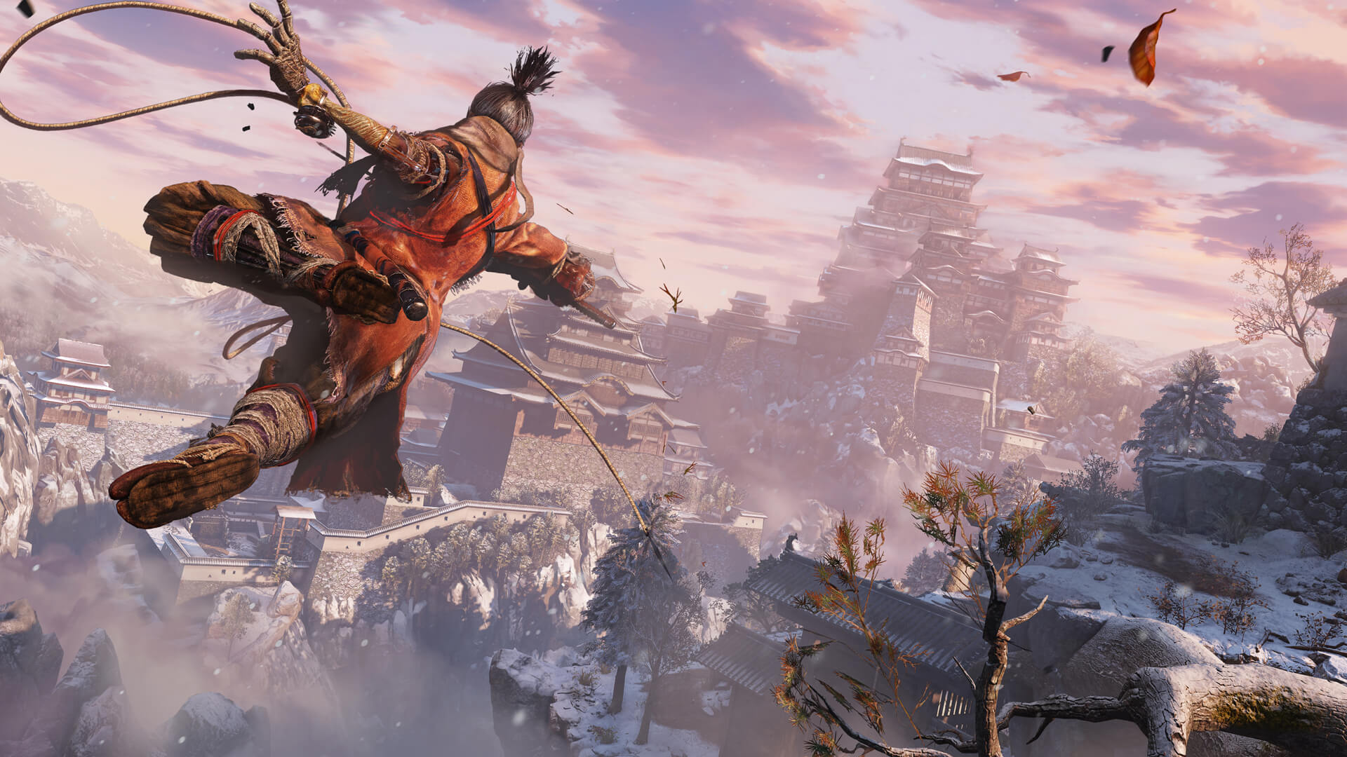 Le shinobi utilise son grappin au-dessus d’un paysage de montagnes et de forteresses.