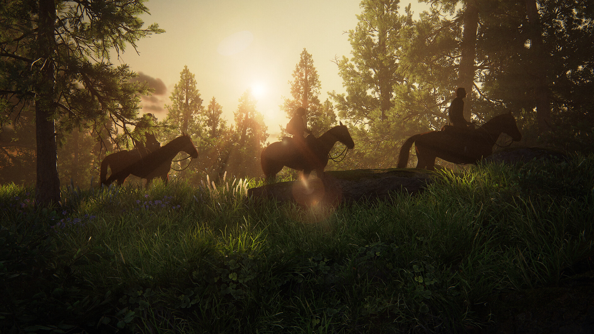 Des personnages traversent à cheval une clairière au soleil couchant.