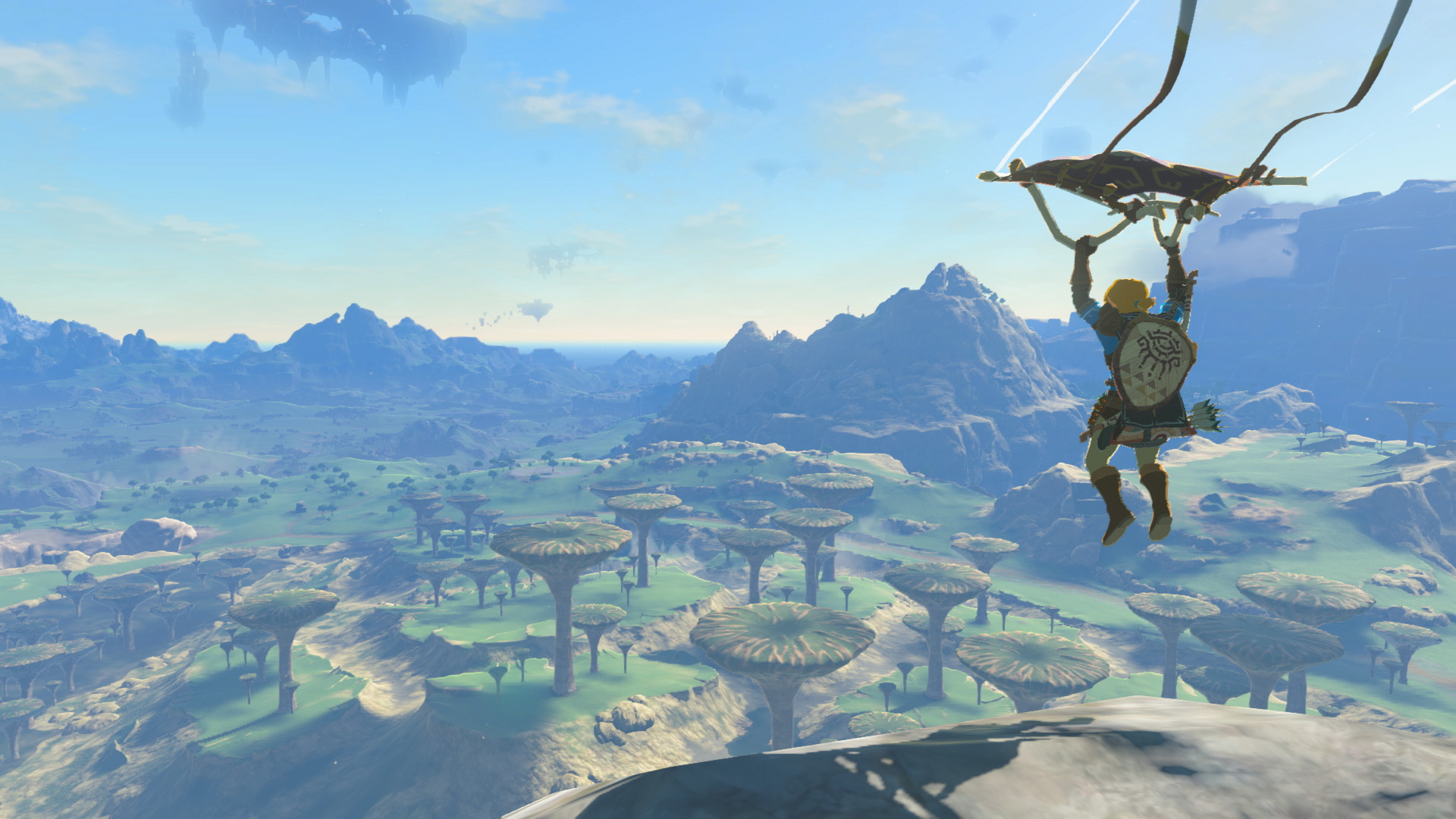 Link survole Hyrule avec sa paravoile.