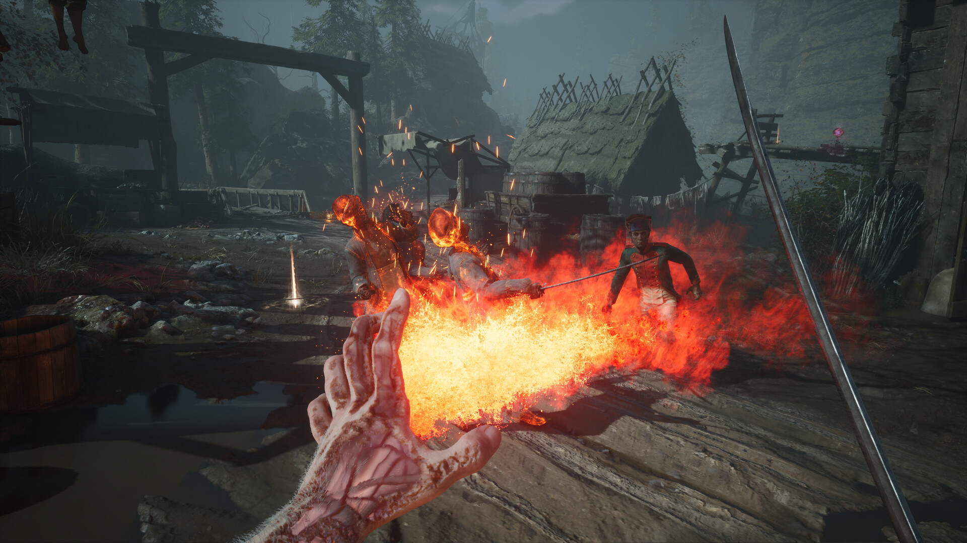 Une main projette des flammes vers un adversaire.