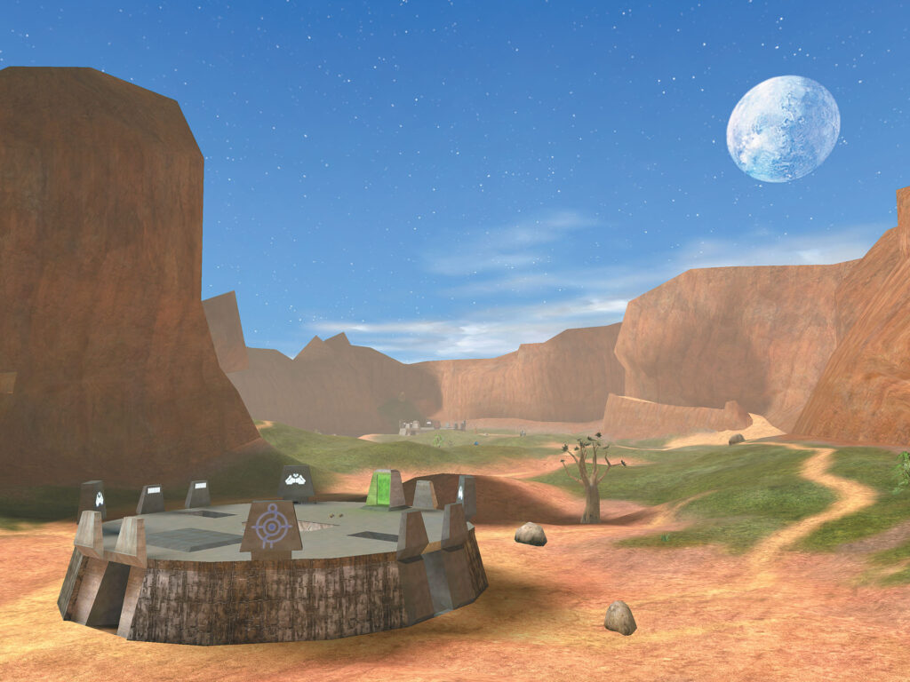 Capture officielle du rendu classique de Halo: Combat Evolved : une base de Blood Gulch dans un canyon, sous un ciel bleu étoilé.