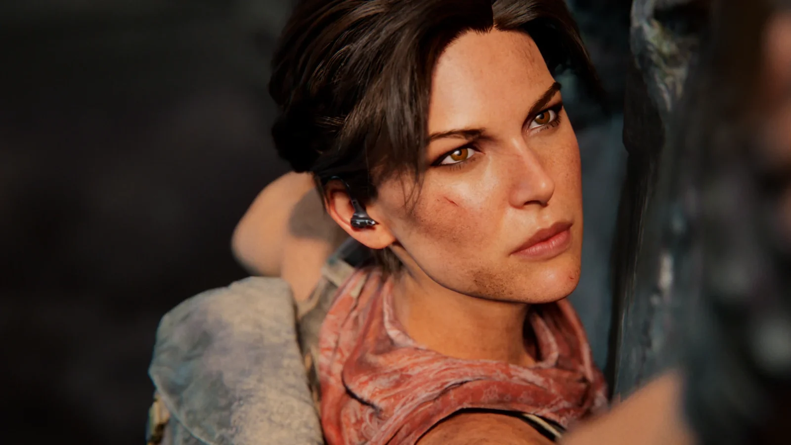 Key art officiel de Tomb Raider: Catalyst montrant Lara Croft escaladant une paroi